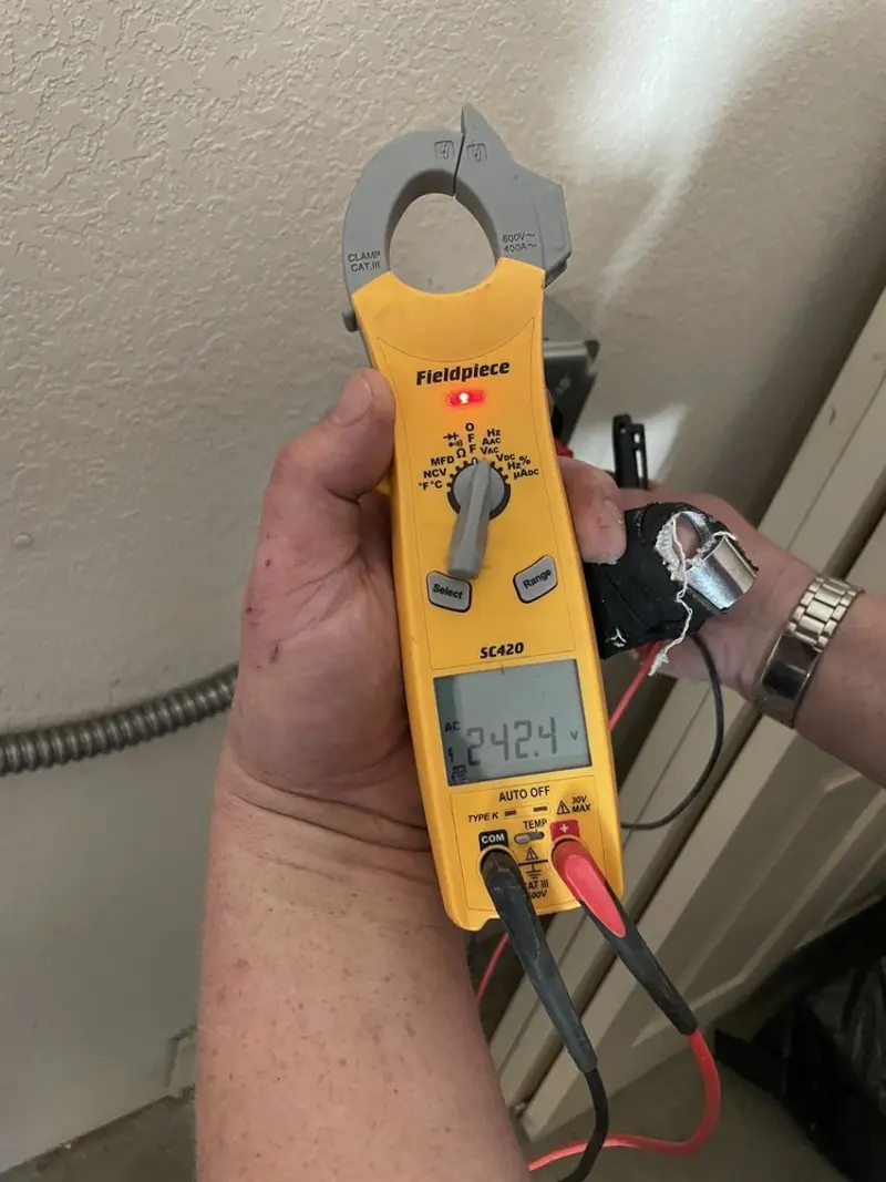 Voltage testing with clamp meter during Generator Installation in North Lakeport